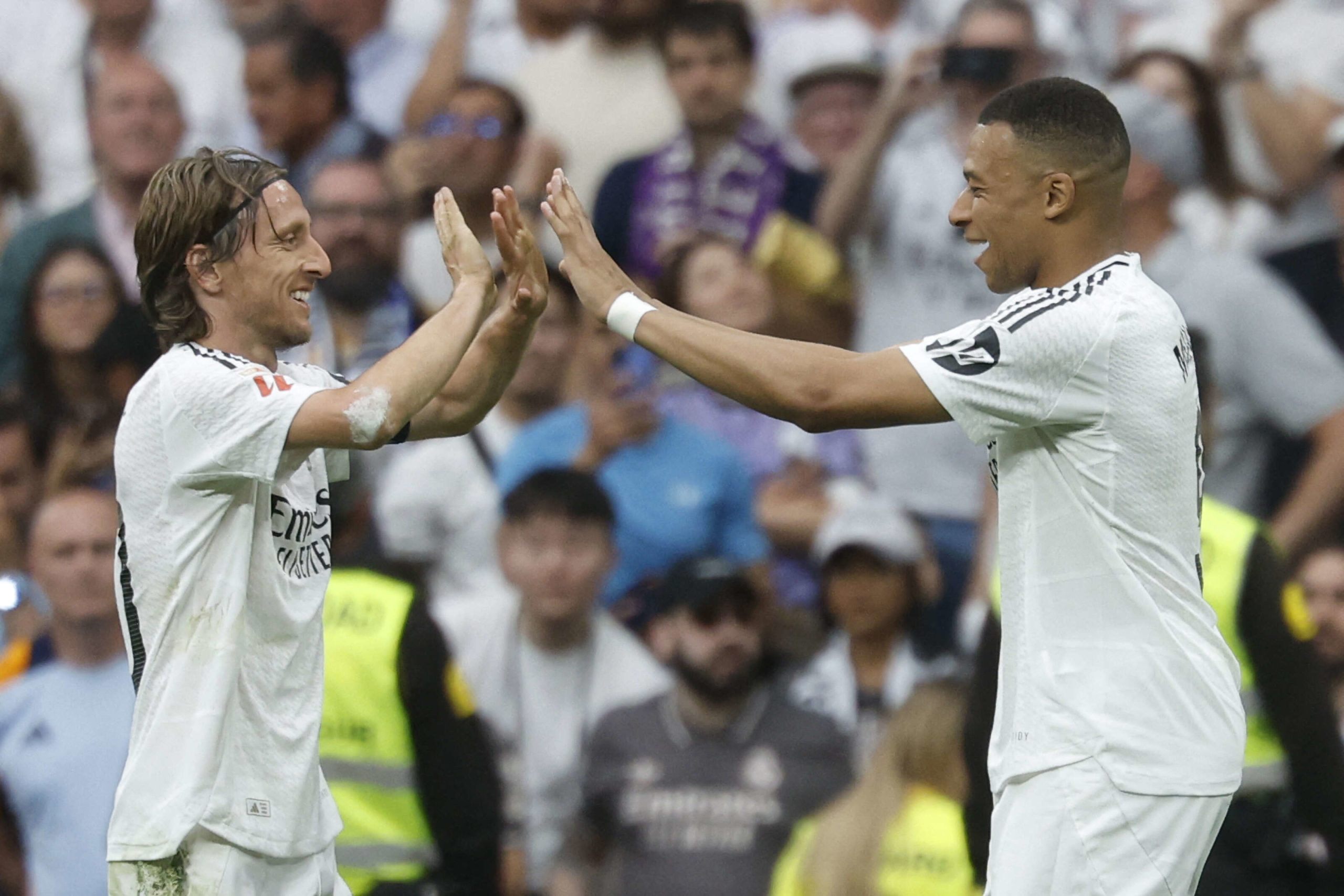 الكرواتي لوكا مودريتش مع الفرنسي كيليان مبابي