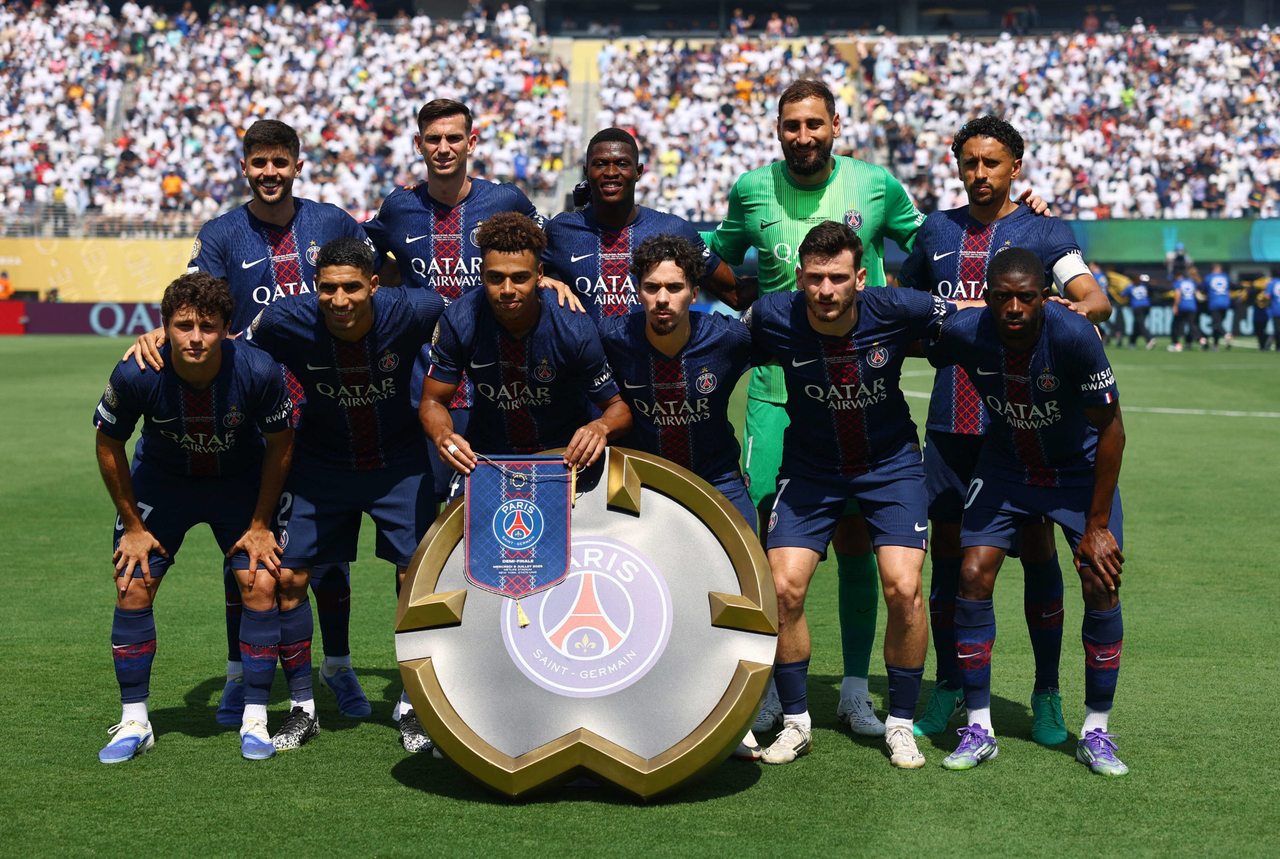 Paris Saint-Germain players pose