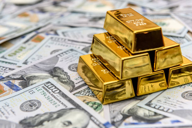 الذهب يتماسك والدولار يستقر